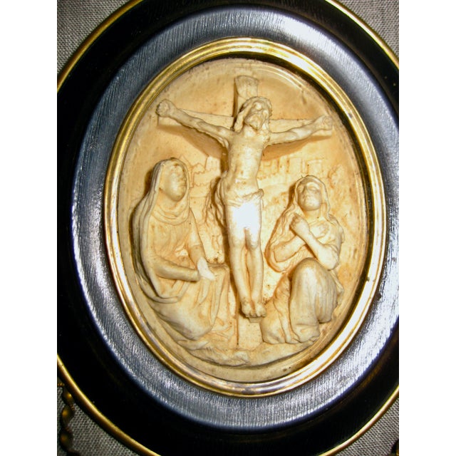 Very popular in the 18 hundreds and highly collected today this kind of frame often has a religious scene , here we have a...