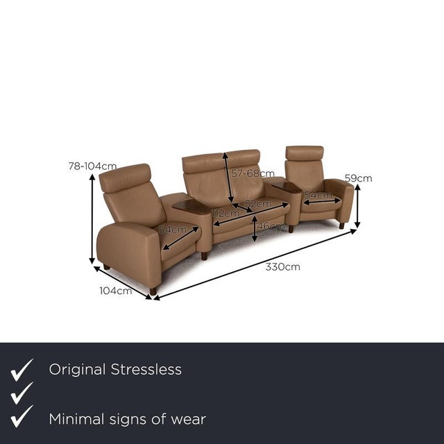 The four-seater Arion chair from Stressless is upholstered in beige genuine leather and stands on round wooden legs. It...