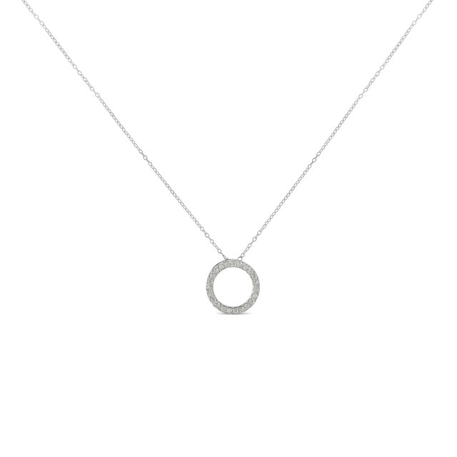 This spectacular circular pendant necklace is hand-crafted of the finest .925 sterling silver and stunning genuine...