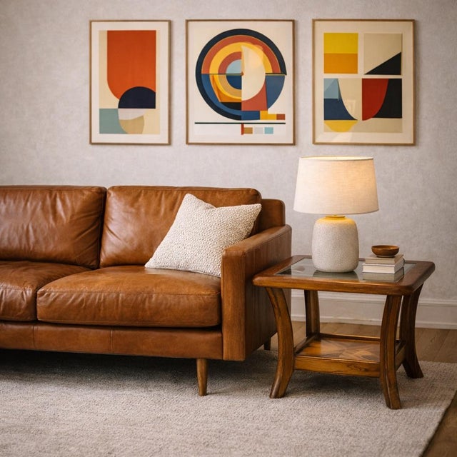 Pair of Late Mid-Century Oak Side Tables With Smoked Glass Tops. A coordinated pair of late mid-century side tables...
