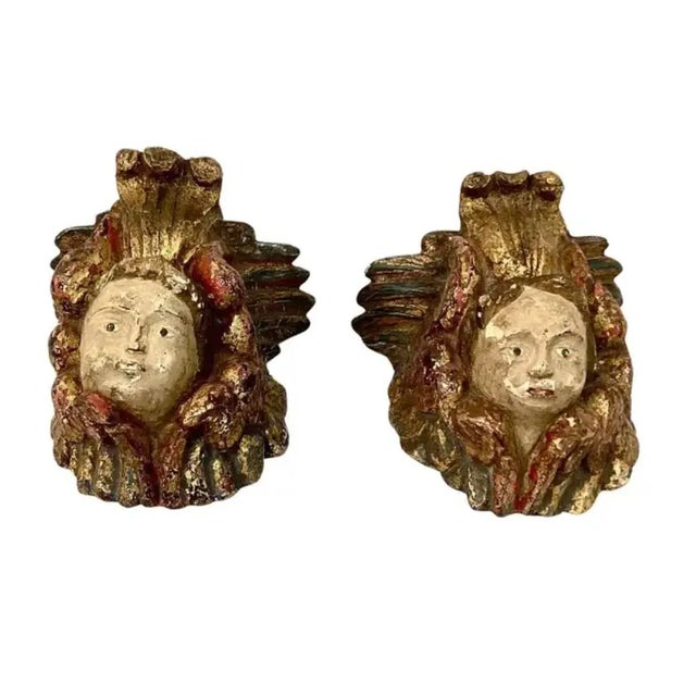 Pair of 18th Century Italian figural carved Angel wall brackets. Brackets feature charming angel faces under small flat...