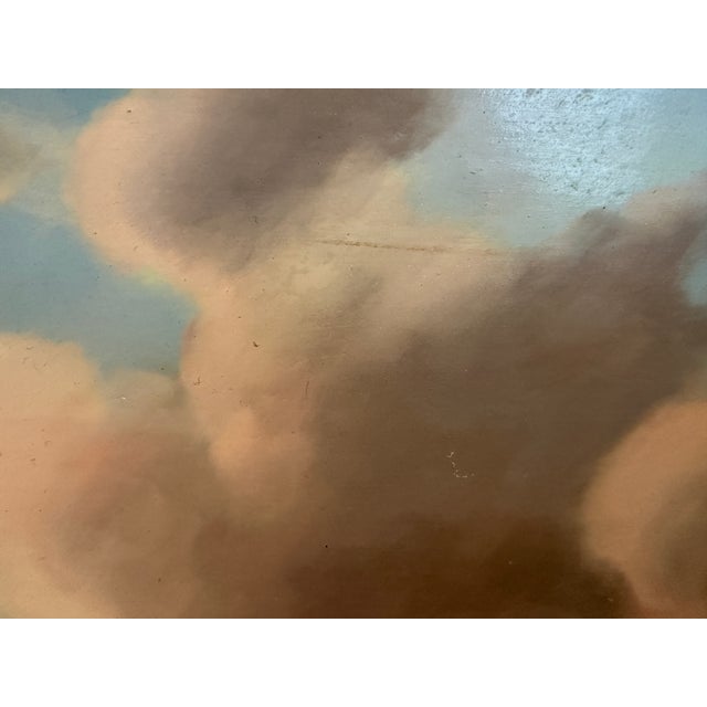 This finely painted oil on board depicts a classic Dutch winter landscape with villagers gathered along a frozen roadway...