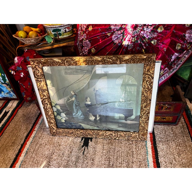 Up for consideration is a beautiful vintage print of women and piano in a gold frame. This would look lovely in your home...
