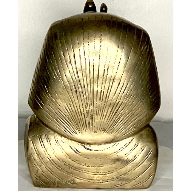 Revisit the wonder of ancient Egypt and the tomb of King Tut with this realistically sculpted brass casting from the late...