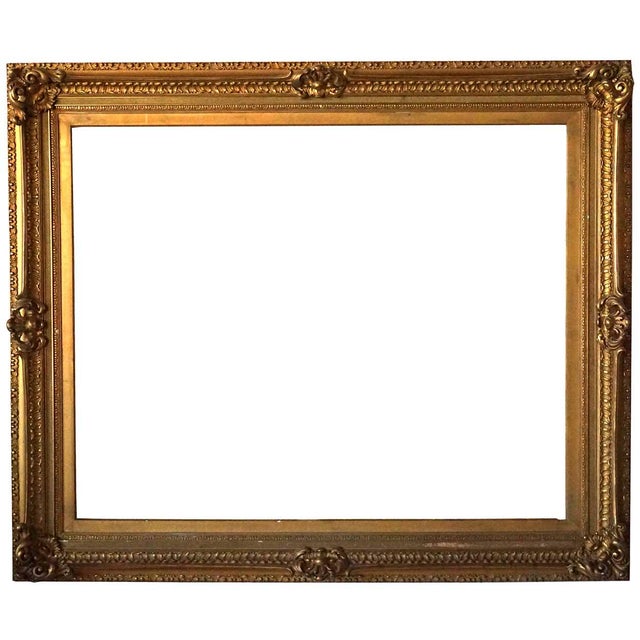 DETAILS A very large scale antique gold gesso frame that can be used to frame a painting or mirror. Can be oriented...