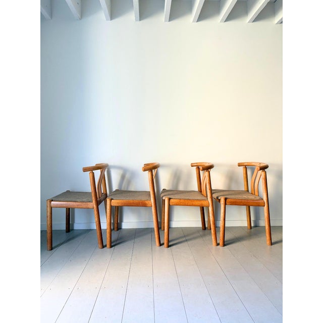 A set of four danish dining chairs designed by hans jørgen frydendal for boltinge stolefabrik in the 1970's. These well...