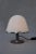 A collectible italian mushroom-style lamp, model kuala, designed by franco bresciani for iguzzini. This compact and...