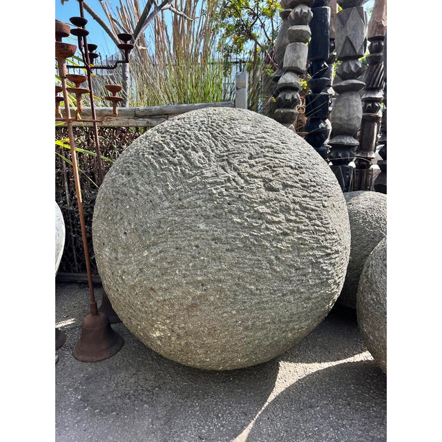 Vintage rustic stone garden sphere hand-carved from granite. Each slightly unique in natural textures, tones and patina. A...