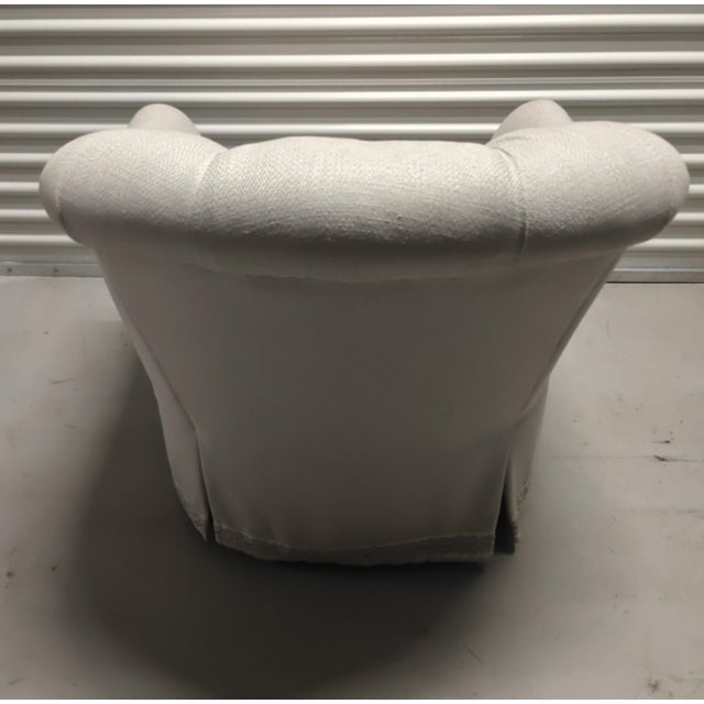Elevate your living space, bedroom, or cozy reading nook with this custom-crafted swivel barrel chair by renowned trade...
