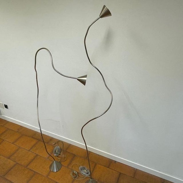 Papiro floor lamps, a celebrated icon of contemporary design designed by Sergio Calatroni in 1989 for the Italian company...