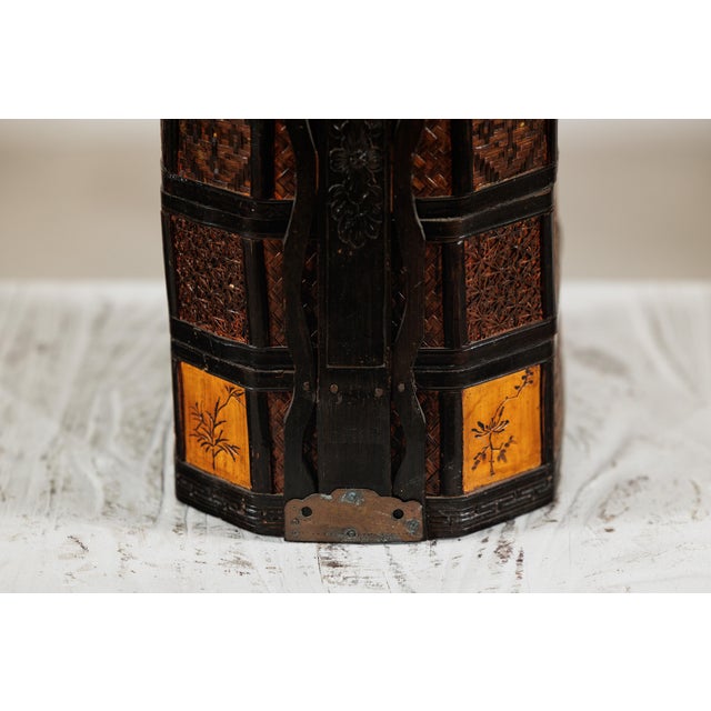 "About the Item This Chinese four-tier basket presents a compelling mix of woven craftsmanship, lacquered structure, and...