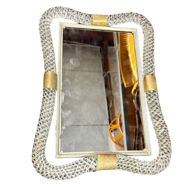 This elegant Italian Murano vanity tray features a rectangular mirror encased in a striking, sculptural border of hand-...