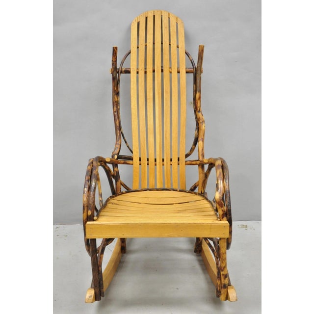 Vintage Adirondack Tree Branch Twig Arts & Crafts Primitive Rocker Rocking Chair. Circa Late 20th Century. Measurements:...