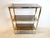 Add a touch of timeless vintage character to your interior with this beautiful mid-century etagere. Designed in the iconic...