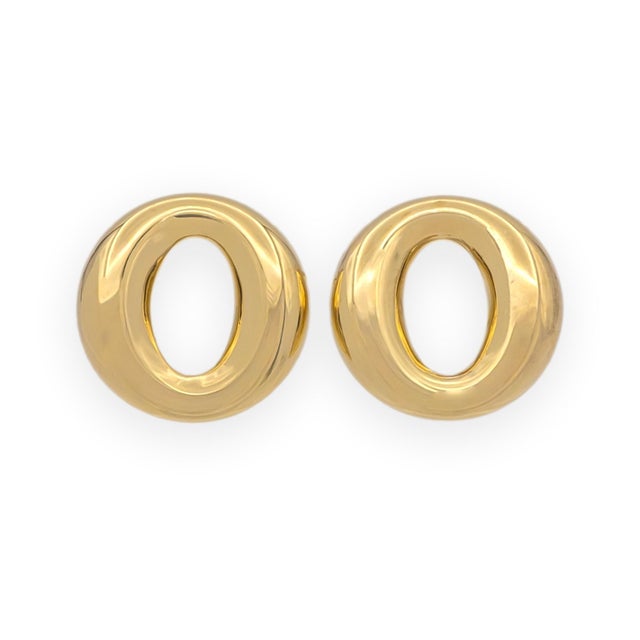 A pair of Tiffany & Co. Elsa Peretti Sevillana stud earrings crafted in solid 18K yellow gold. The design features a...