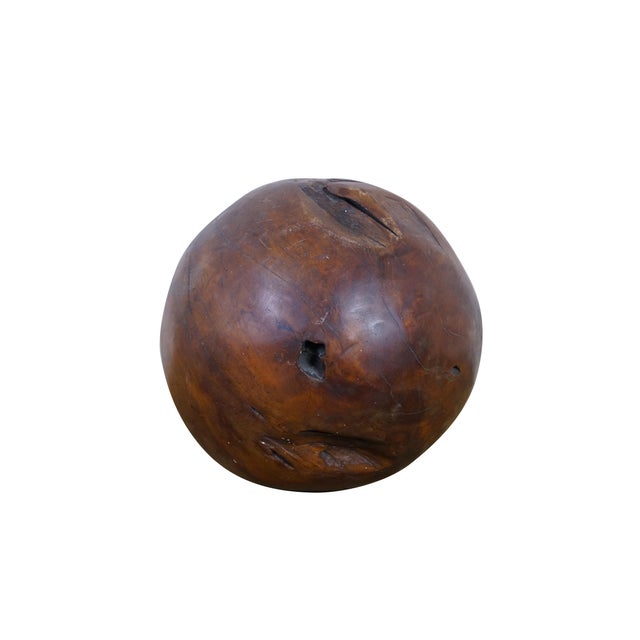 Vintage Indonesian dark teakwood garden orb / sculpture. Dimensions: 12.5" x 12" (D x H)