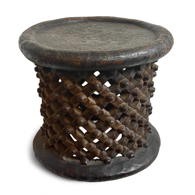 Authentic vintage hand carved Bamileke tribal wood stool/side table. Masterfully crafted from one piece of indigenous...