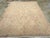 An antique Turkish Oushak accent carpet. Leaves, leaves everywhere, but few flowers, on the lightest tan ground of this...