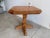 An elegant rustic table from Burgenland. Dimensions: Height x Width x Depth 52 x 54 x 54 cm. Solid pinewood table. This is...