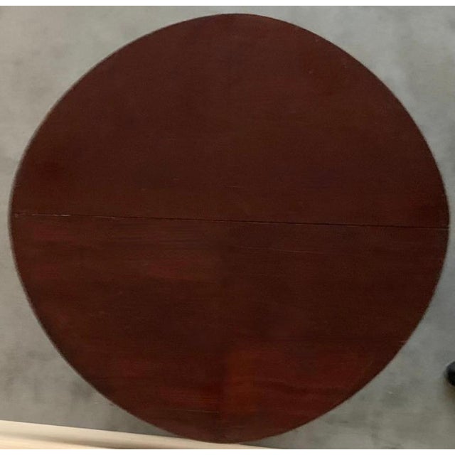 Antique early 19th century French Biedermeier period mahogany centre / breakfast table featuring round form with carved...