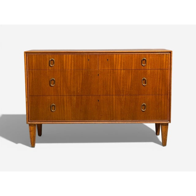 Axel Larsson, Bodafors, Swedish Modern, Chest of Drawers, Mahogany Veneer, Sweden, 1940s A modernist cabinet designed by...
