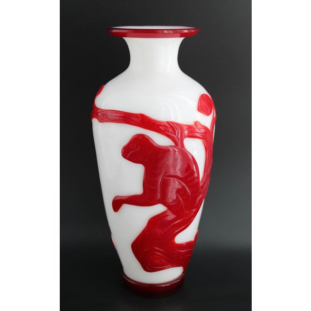 Large Antique Chinese Red & White Peking Glass Vase with Hand Carved Monkey and Botanicals. Late Qing to Early Republic...