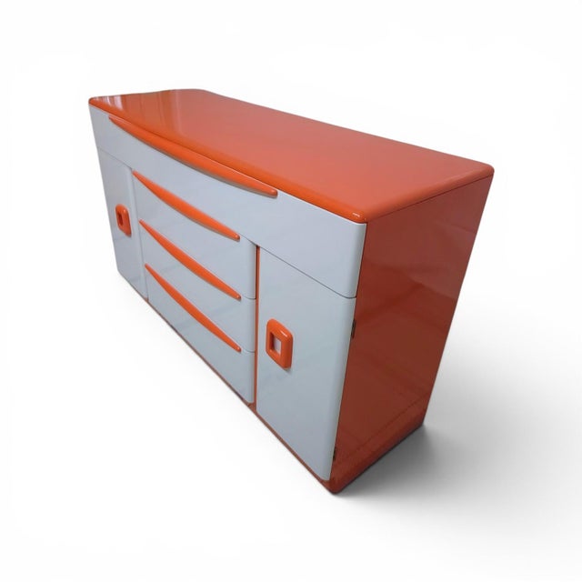 An energetic eye catching statement piece steeped in mid century heritage.The iconic Heywood Wakefield M593 credenza from...