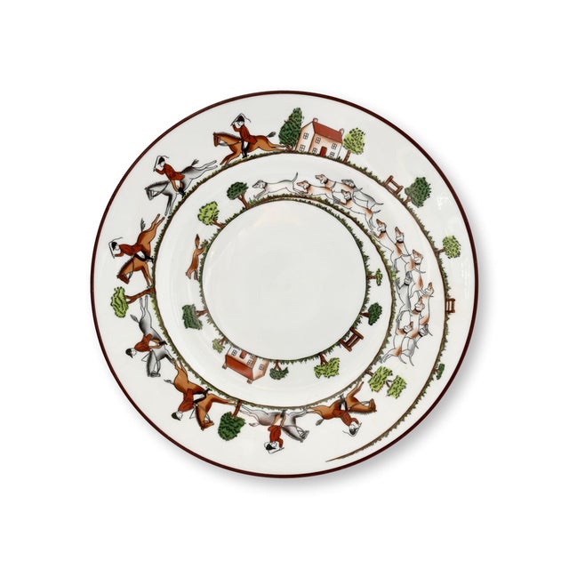 A charming pair of Crown Staffordshire 8.25 inch plates in the beloved Hunting Scene pattern. Mounted riders, eager...