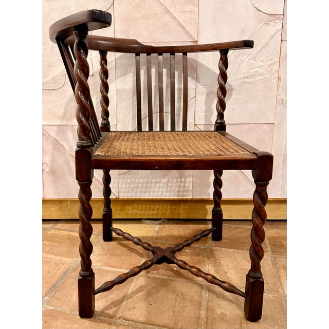 Rare Antique English Oak Corner Chair Featuring a Woven Cane Seat with Barley Twist Legs, Posts, & Stretchers. Circa Late...