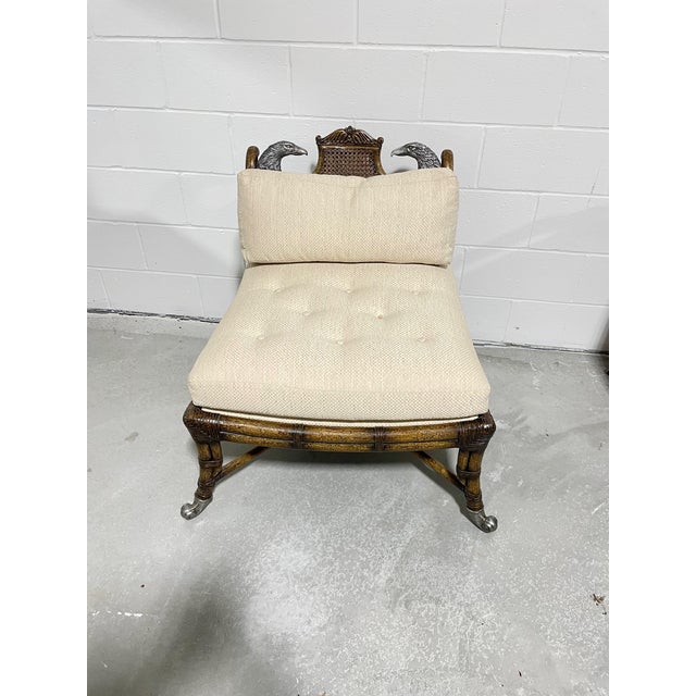 A very unusual armless occasional chair made by Maitland Smith. In rattan with a tortoise shell lacquer finish this...