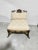 A very unusual armless occasional chair made by Maitland Smith. In rattan with a tortoise shell lacquer finish this...