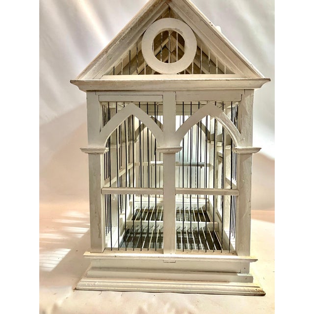 This deluxe bird cage is a smartly constructed shelter for your feathery friends. a spacious structure with plenty of room...