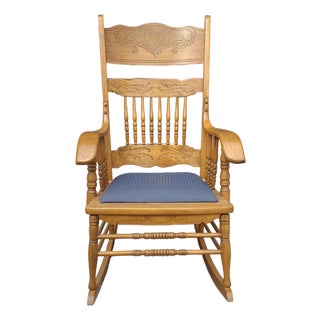 Early 20th Century Carved Oak Press Back and Upholstered Seat Rocker Chair For Sale