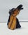 Unique handmade sculpture featuring two horse heads. This Hollywood Regency piece, crafted from hand-painted ceramic and...