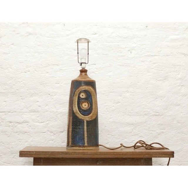 The base has a height of 55 cm. With the mounting for the shade, it is 78 cm high. This piece has an attribution mark, I...