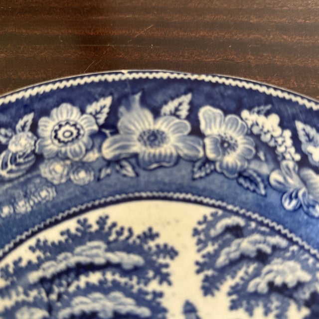 Listing is for a Thomas Fell blue transferware ironstone plate in the “Wild Rose” pattern. Diameter is 9 1/2” mid 19th...