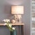 Birch veneer is wrapped around the modern oval shape of the Forester Table Lamp to highlight the texture and tones of the...