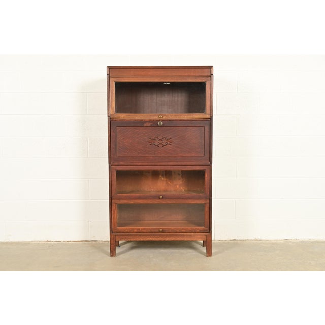 A beautiful antique Mission or Arts & Crafts period barrister bookcase with drop front secretary desk In the manner of...