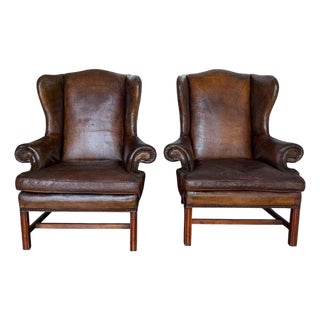 Pair of English Georgian Style Wingback Armchairs - Distressed Brown Leather For Sale