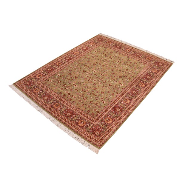 Designed with mesmerizing intricacy and gorgeous color palette, this hand-knotted masterpiece demonstrates the beauty and...