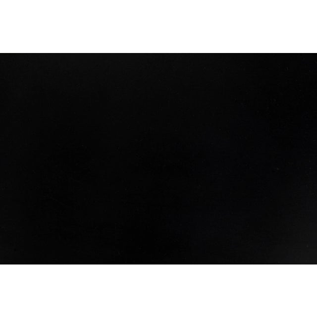 The sleek lines of this metal console need no further adornment. The rounded rectangular top provides display or storage,...