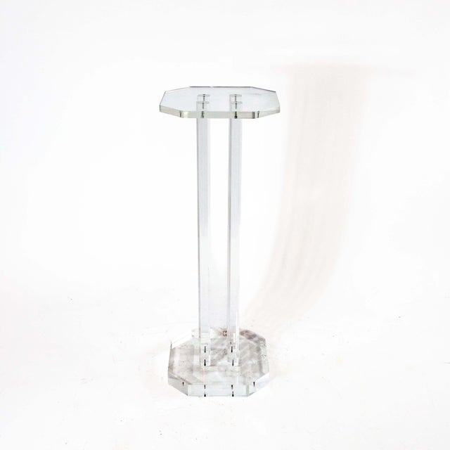 This remarkable acrylic glass column from the 1980s embodies the minimalist aesthetic of postmodernism. The octagonal...
