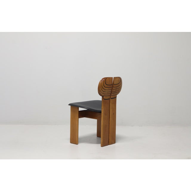 Originally hand-finished and assembled one by one, "Africa" ​​features a solid wood support structure with a thin...