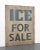 Reclaimed movie set sign made of aluminum in grayish-white, blue, and black colors. The sign reads "Ice for Sale". There...