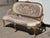 This is a high quality elegant, English settee or sofa in the French Hepplewhite revival or Louis XV style, upholstered in...