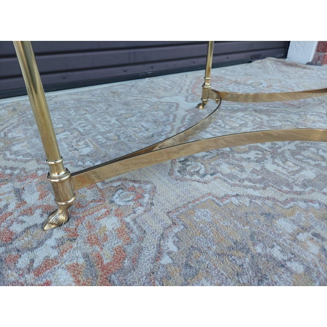 1970s Vintage Hollywood Regency Brass Oval Coffee Table Glass Top and Hoof Detailed Feet. For Sale - Image 5 of 5
