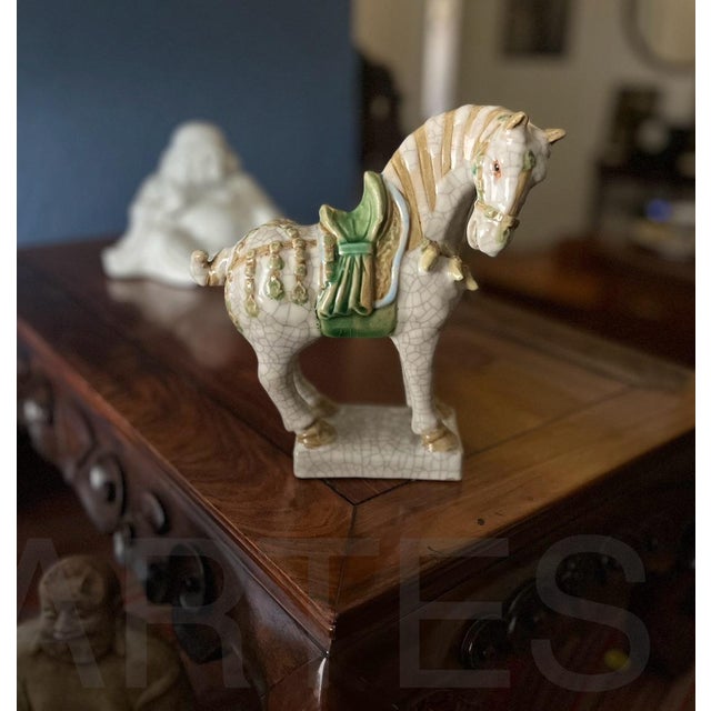 Add a classic Asian touch to your decor with this Tang dynasty style ceramic Chinese war horse. This fine mid-century...