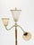 A striking Swedish Modern floor lamp executed in richly grained mahogany with refined brass detailing, Sweden, circa...