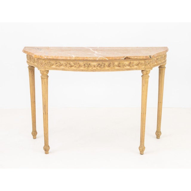 Neoclassical Style Marble Top Demilune Console Table, the marble top on beige painted fluted tapered legs. 32" H x 49" W x...