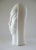 A nod to Constantin Brancusi's "Mademoiselle Pogany Alien," this vintage tall and slender white ceramic sculpture is both...